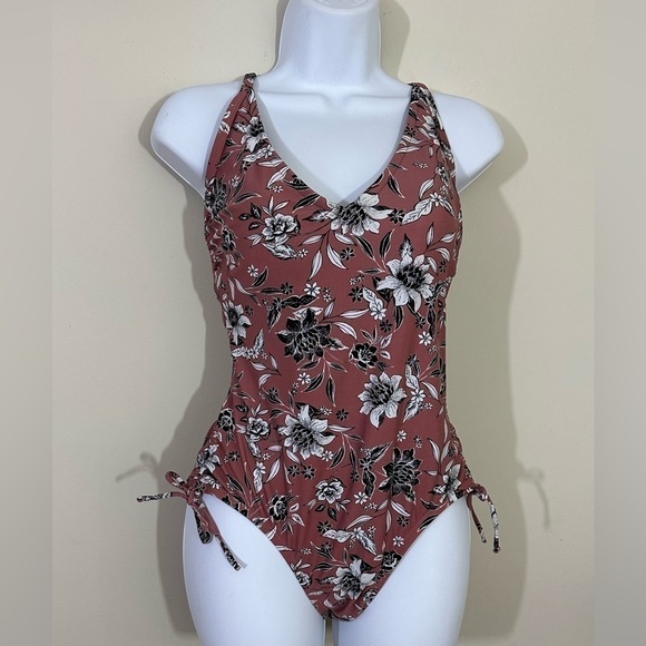 Kona Sol sz med swimsuit tan with a little pink undertone and a floral print - Picture 1 of 13